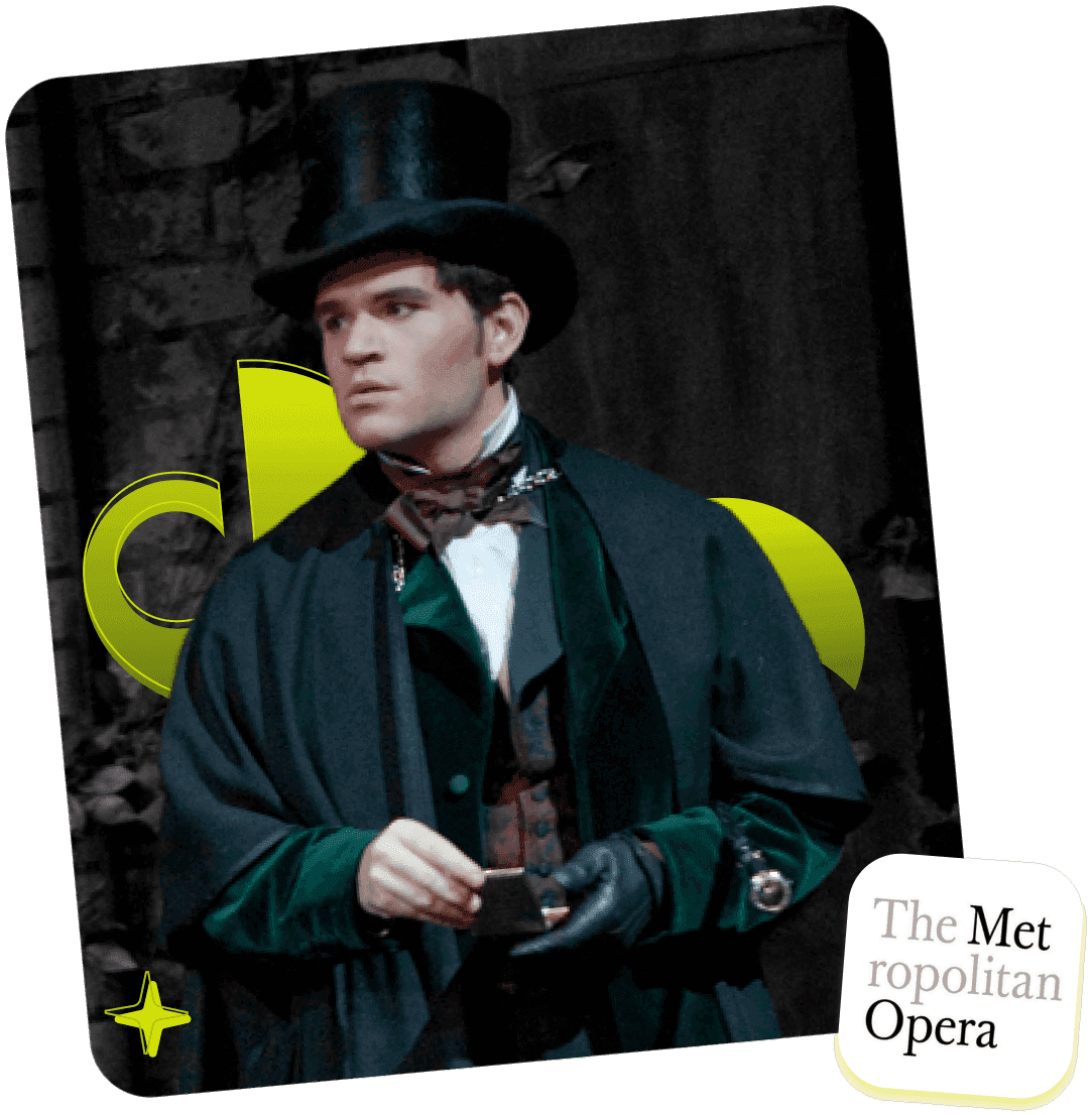 Michael Fabiano in costume and top hat on the Metropolitan Opera stage