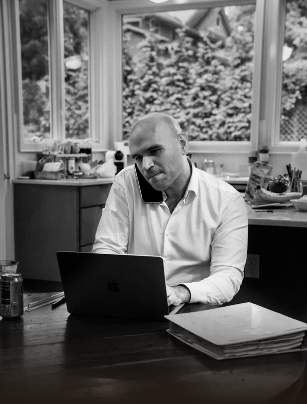 Michael Fabiano on a call at his desk